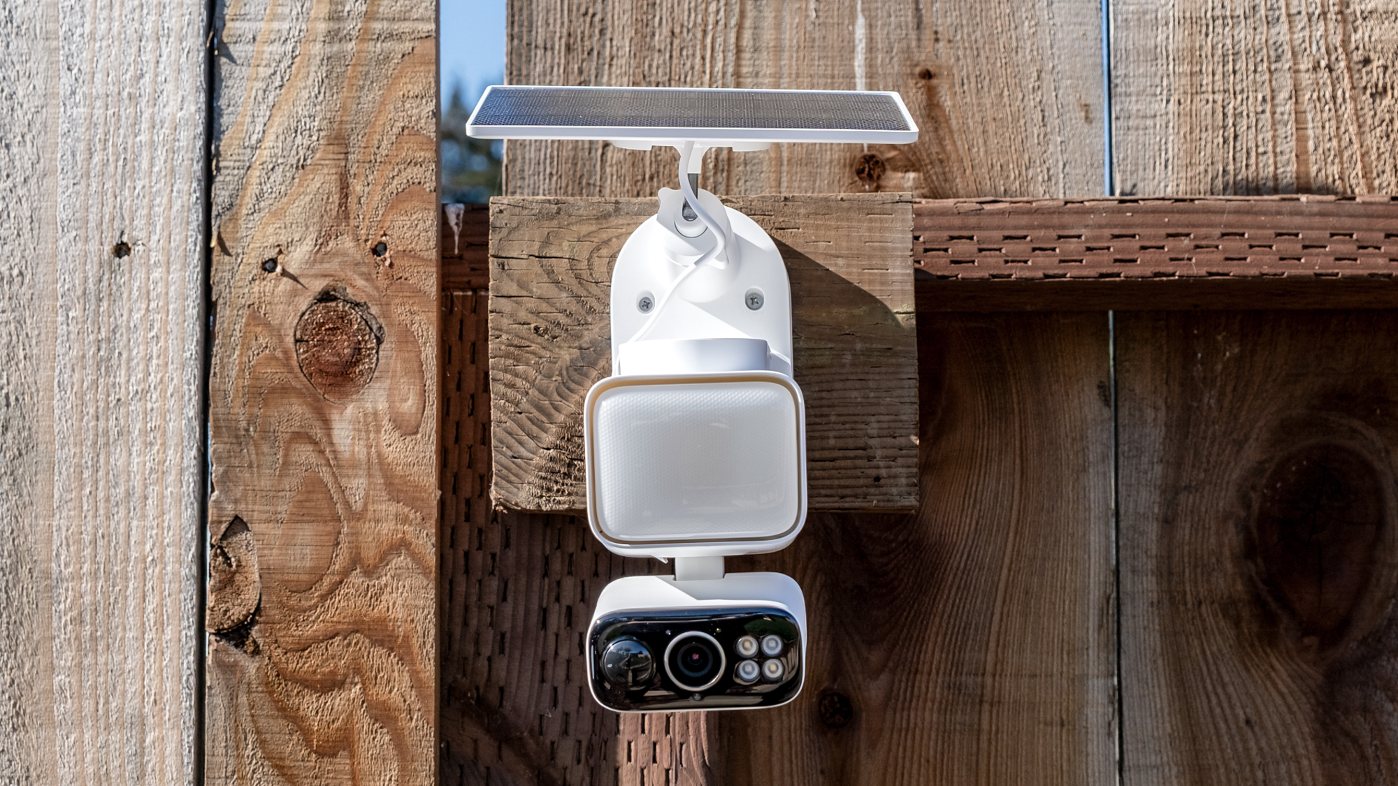 A TP Link Tapo C615F security camera mounted to a fence