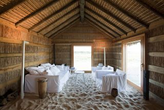 Barn with sand and sofa seating area