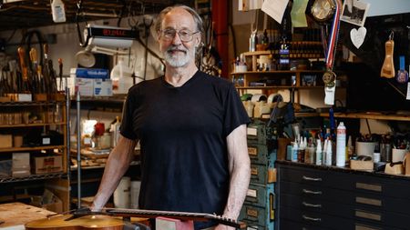 Ken Parker poses in his workshop