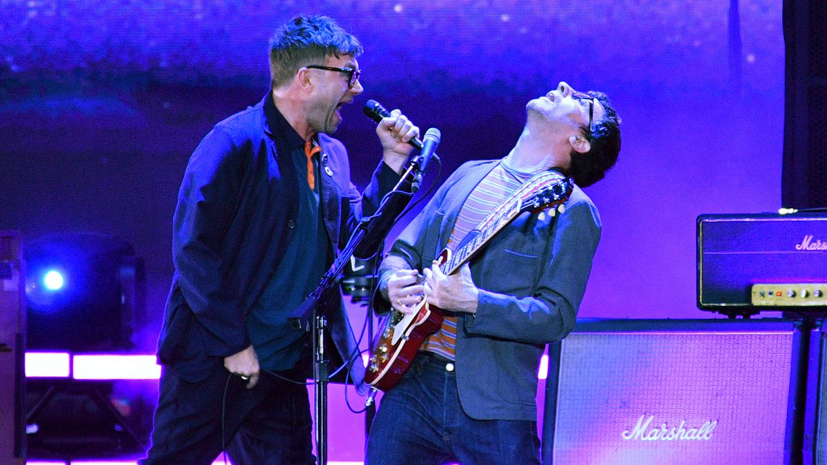 Damon Albarn and Graham Coxon of Blur perform at Wembley Stadium on July 08, 2023 in London, England