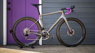 Enve Melee in front of purple door