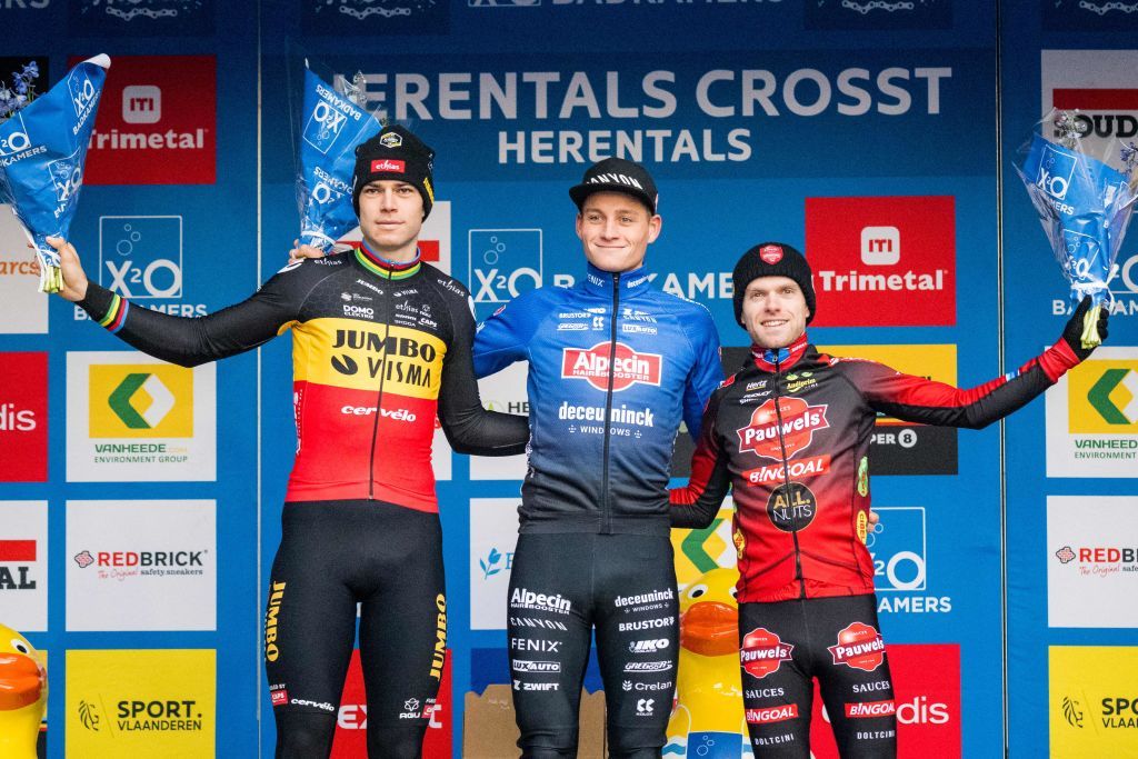 Belgian Wout Van Aert Dutch Mathieu Van Der Poel and Belgian Eli Iserbyt celebrate on the podium after winning the mens elite race at the Herentals Crosst cyclocross cycling event on Tuesday 03 January 2023 in Herentals the fourth stage in the X2O Badkamers Trofee Veldrijden competition BELGA PHOTO JASPER JACOBS Photo by JASPER JACOBS BELGA MAG Belga via AFP Photo by JASPER JACOBSBELGA MAGAFP via Getty Images