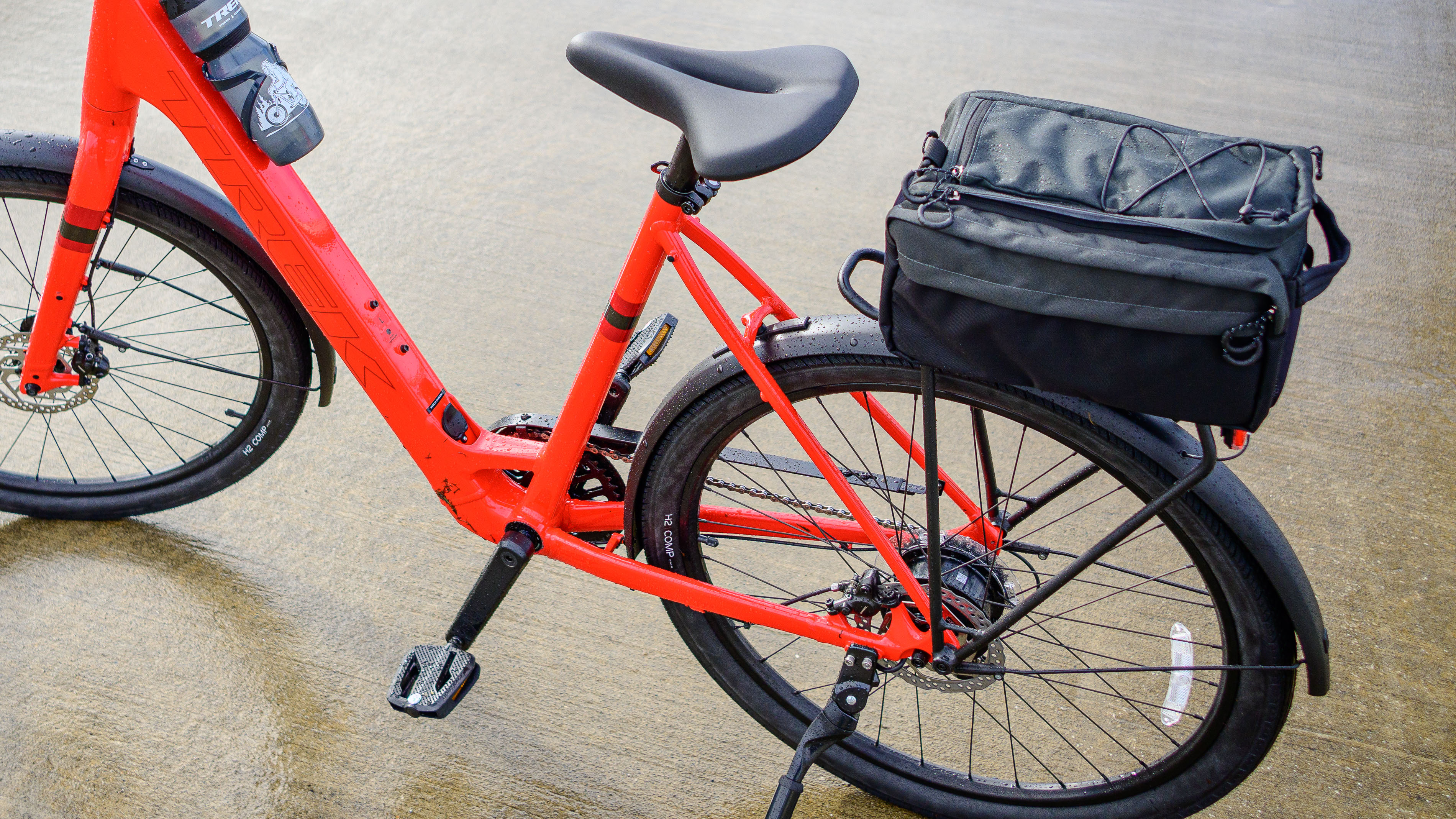 A close-up of the back of a red Trek Verve+ 1 LT ebike.