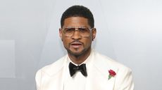 usher on a white background
