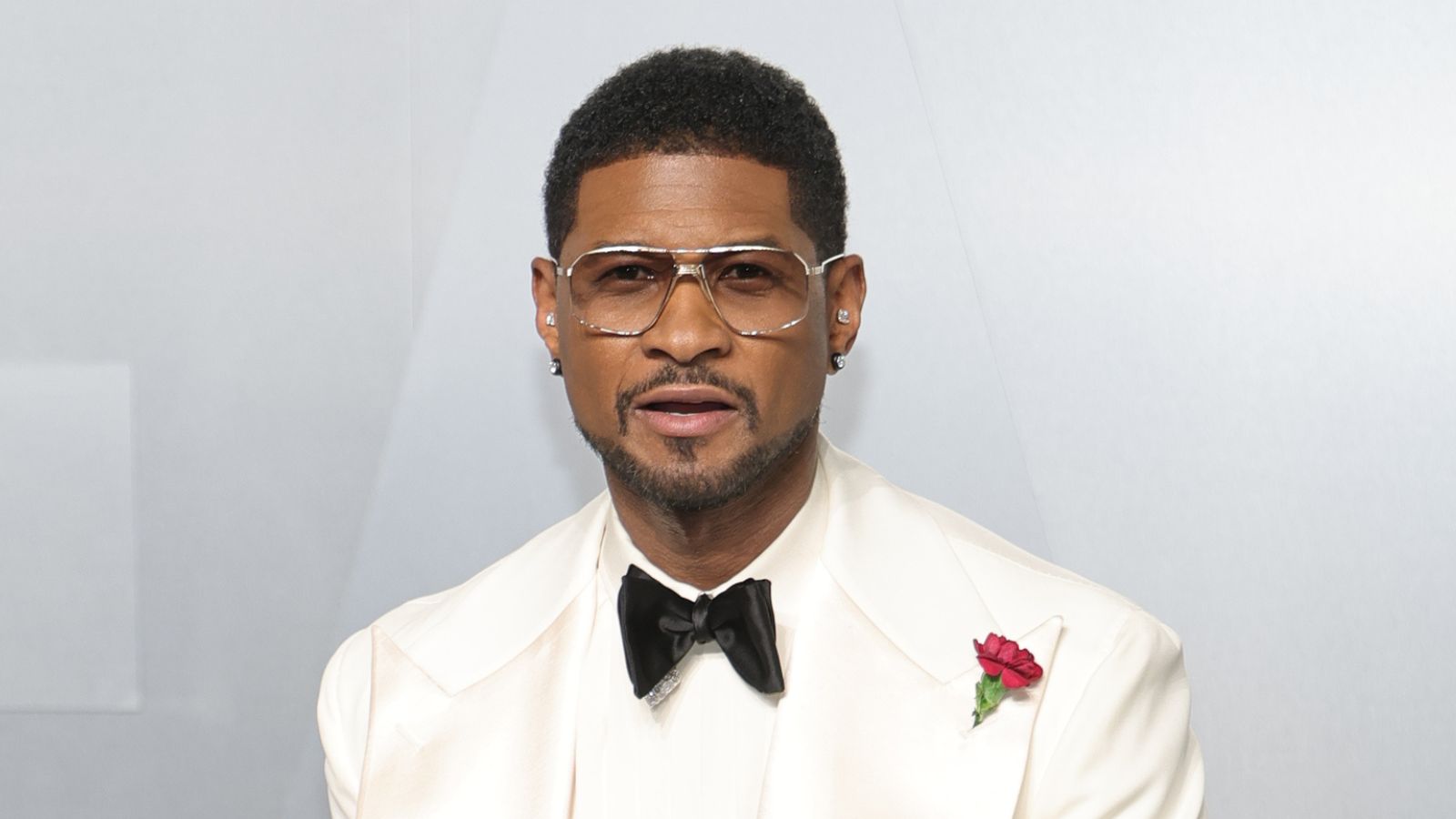 usher on a white background