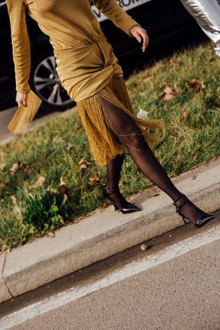 woman in black sequin dress