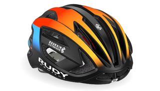A black helmet with hot orange graphics