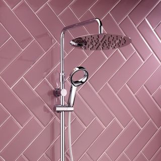 Pink tiled bathroom with silver shower