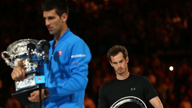 Andy Murray of Great Britain looks on as Novak Djokovic of Serbia 