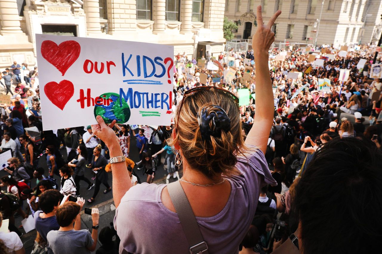 Eco-anxiety: A woman protesting at a climate change march