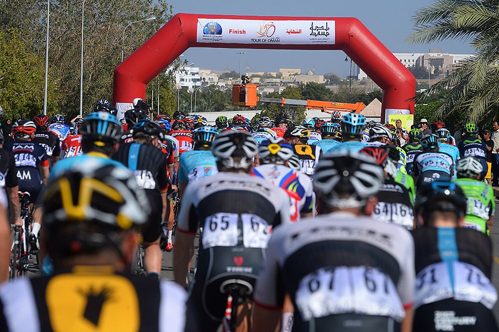 The peloton arrives to the finish of the cancelled stage