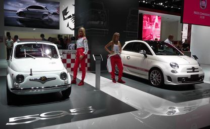 Models posing with the car