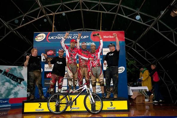 The team four cross podium at the World Cup in Maribor, Slovenia