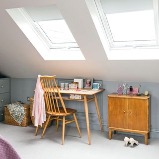 desk with wooden chair and cabinet with white ceiling