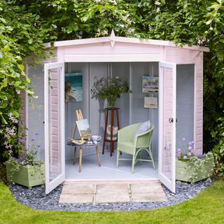 PROTEK garden room 'She Shed' artist's studio painted in 'Protek Rose Pink - Royal Exterior'