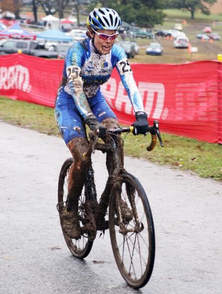 A smiling Georgia Gould takes the win and looking forward to getting rid of all that mud.