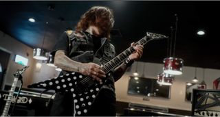 Jackson Pro Series Limited Edition Phil Demmel KV King V: the V-style electric is finished in black-and-white polka dots, and looks good in all settings, against a white background or barroom scene alike.