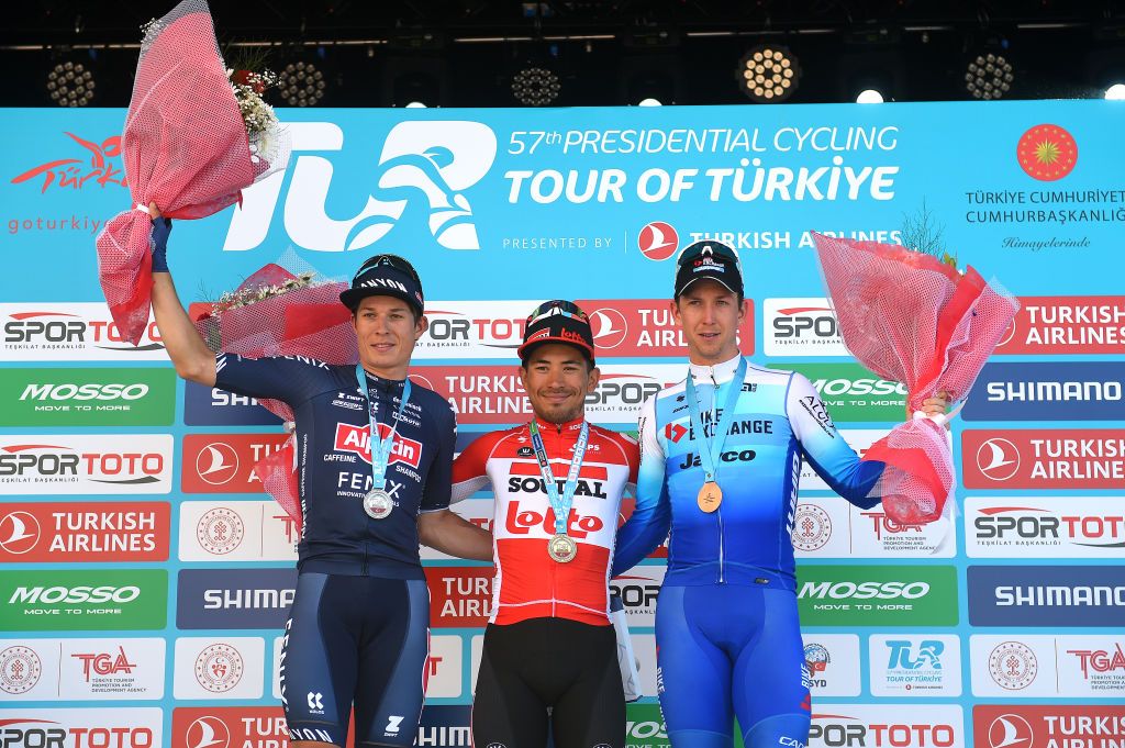 KUSADASI TURKEY APRIL 10 LR Jasper Philipsen of Belgium and Team AlpecinFenix on second place stage winner Caleb Ewan of Australia and Team Lotto Soudal and Kaden Groves of Australia and Team Bikeexchange Jayco on third place pose on the podium ceremony after the 57th Presidential Cycling Tour Of Turkey 2021 Stage 1 a 202km stage from Bodrum to Kuadas TUR2022 on April 10 2022 in Kusadasi Turkey Photo by Dario BelingheriGetty Images