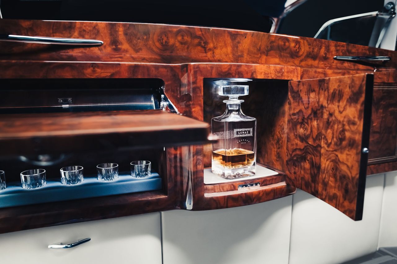 Images of the decadent Phantom V by Lunaz. It is a thing of high quality, looking very vintage with lots of walnut details and original coachwork