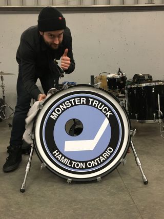 Abbotsford: Our guitar/drum tech Ben getting this new beauty of a drum head in check.