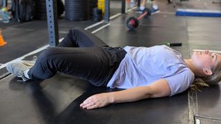 Physiotherapist Stephanie Clark demonstrates lying butterfly stretch