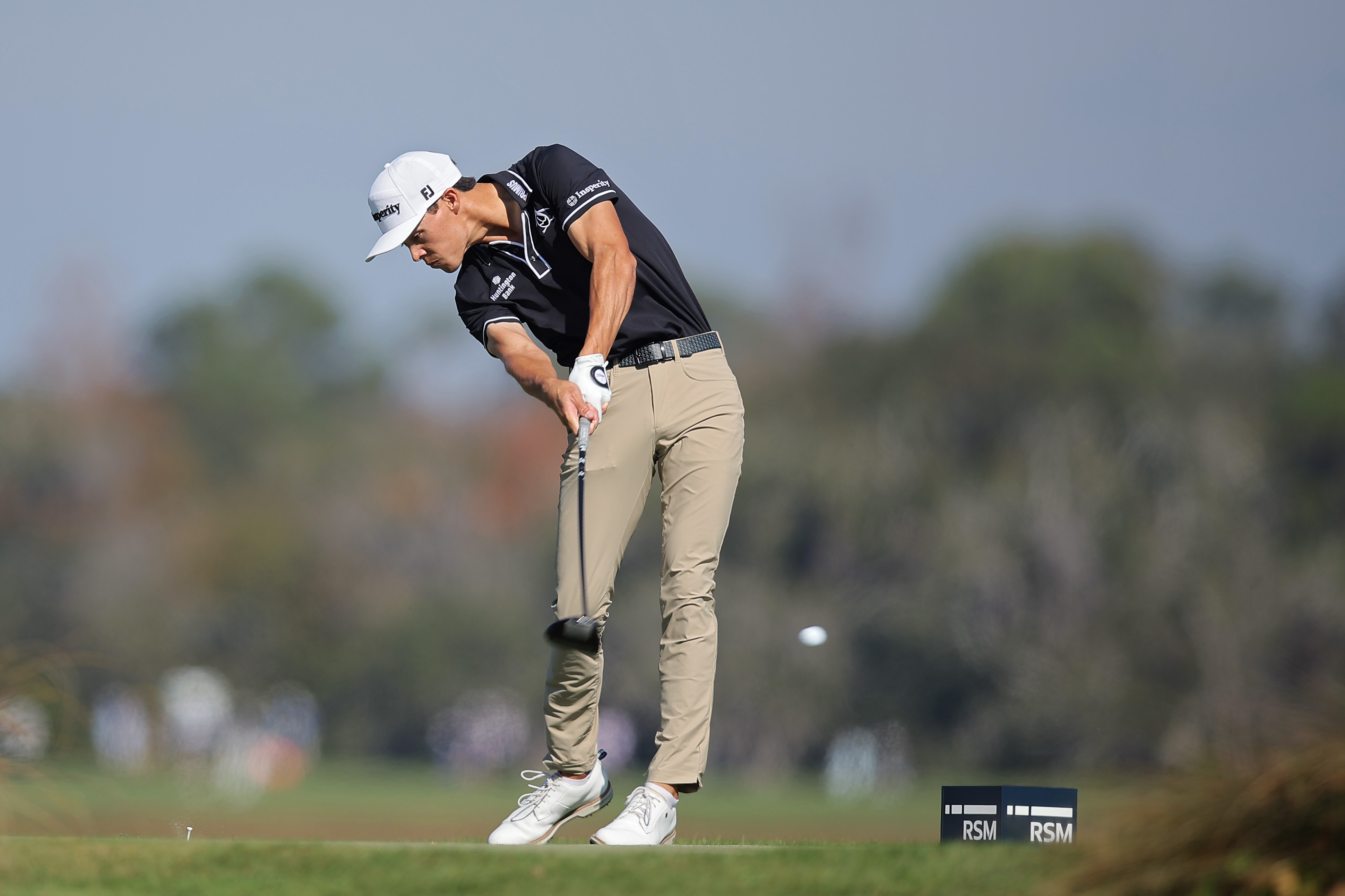 Johnny Keefer at impact on a drive during the RSM Classic