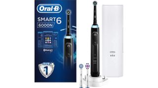 Oral-B SmartSeries 6000 brush beside box and travel case