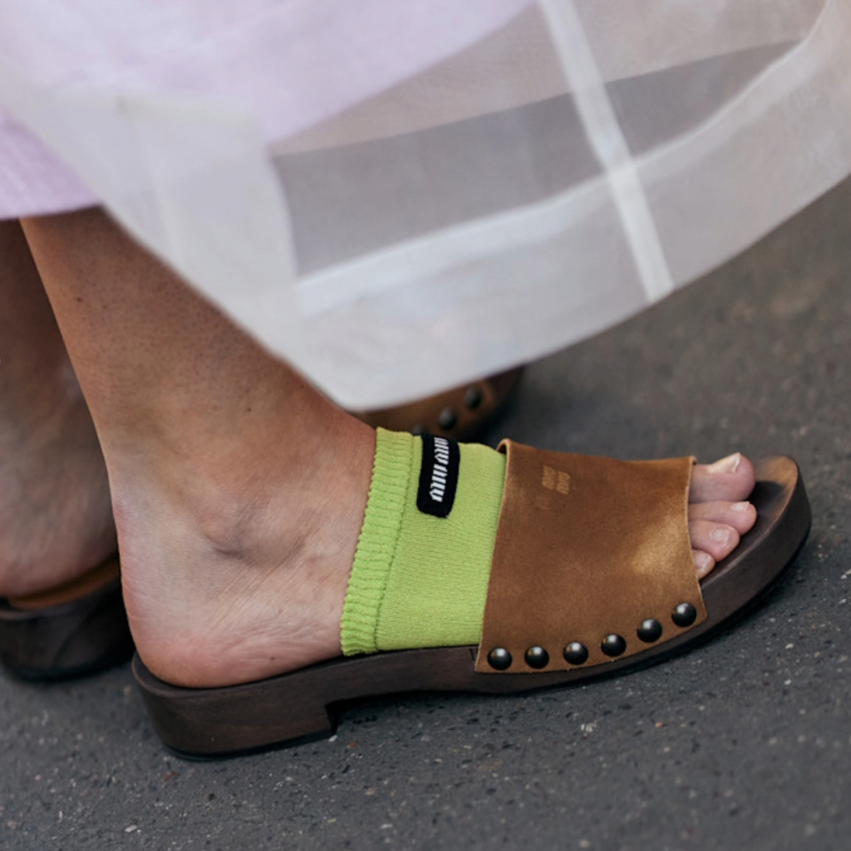 woman wearing brown suede sandals 
