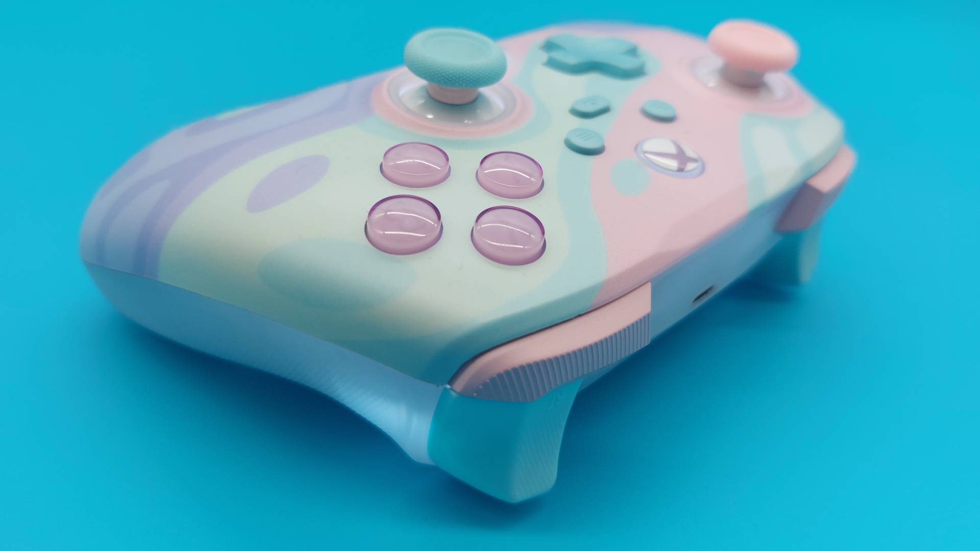 The GameSir T7 Pro Sugar Whirl Wireless Controller seen from various angles.