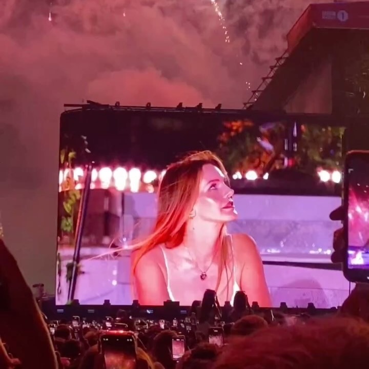 Lana Del Rey on stage with glowing skin