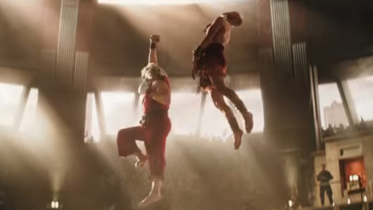 Ken delivering a dragon punch to Dhalsim in Street Fighter