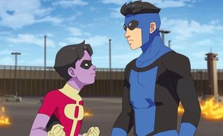 A kid superhero with purple skin and a superhero teen face off