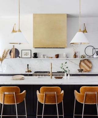 modern kitchen with white walls and counters, black island