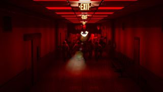 bodies mass in a corridor lit by deep red
