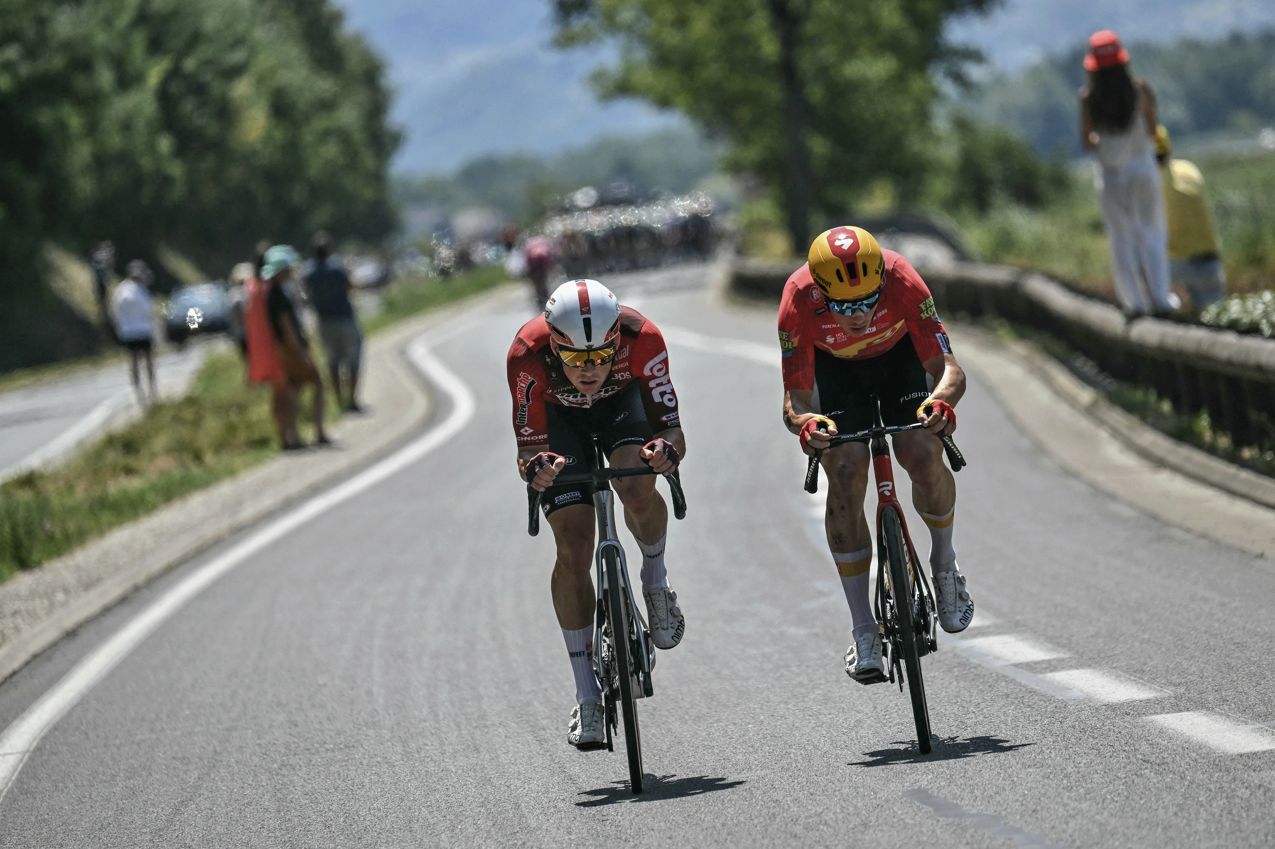 Uno-X Mobility team's Norwegian rider Jonas Abrahamsen (R) and Lotto Intermarch&amp;eacute; team's French rider Baptiste Veistroffer (L) cycle in a breakaway at the start of the 17th stage of the 113th edition of the Tour de France cycling race, 174,7 km between Chamb&amp;eacute;ry and Voiron in the French Alps, on July 22, 2026. (Photo by Jeff PACHOUD / AFP via Getty Images)