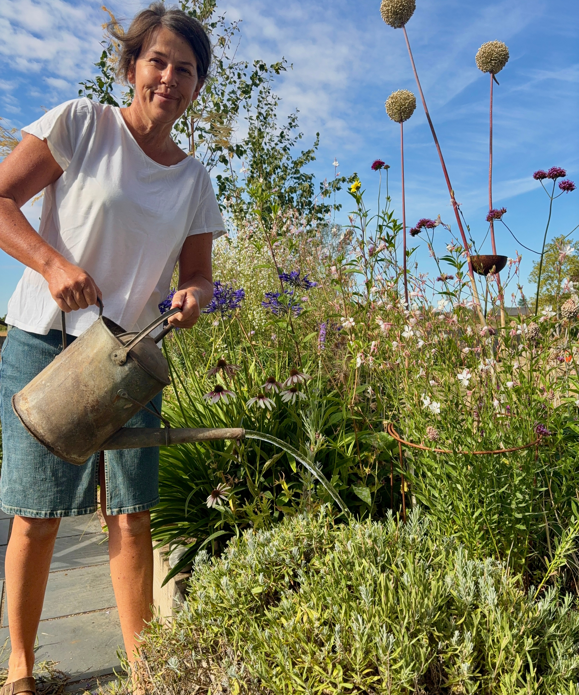 Emma Kendell watering lavender