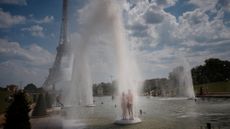 People in Paris try to escape record heat