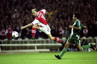 Dennis Bergkamp takes a shot against Panathinaikos at Wembley in the Champions League in September 1998.