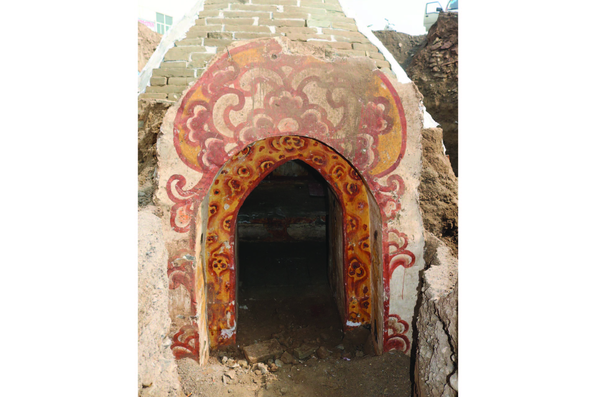 A picture of the outside of the tomb, which also features colorful painting