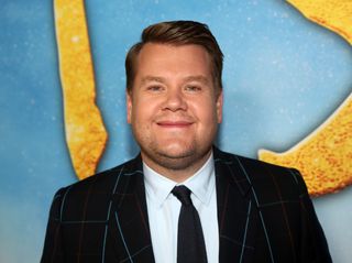 James Corden poses at the world premiere of the new film "Cats" based on the Andrew Lloyd Webber musical at Alice Tully Hall, Lincoln Center on December 16, 2019 in New York City