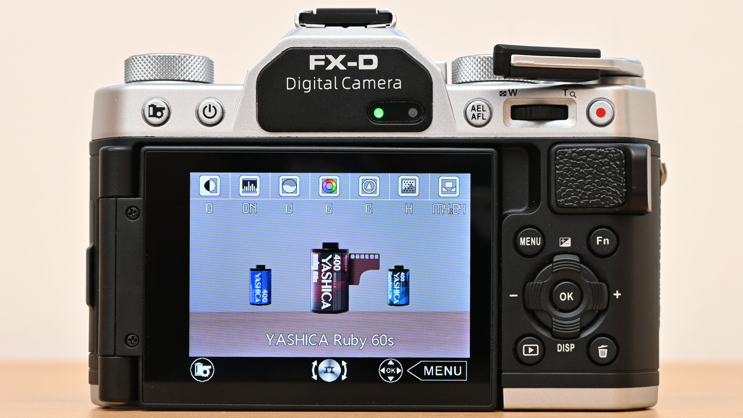 Yashica FX-D 300 product shot, camera held in hand