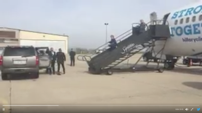 Hillary Clinton disembarked from her plane.