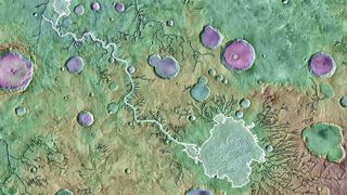 A colored topographical image showing river valleys on Mars.