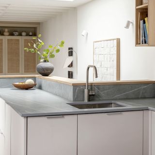 grey kitchen worktops with sink and single mixer tap