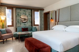 Richly textured hotel room at Ca’ di Dio hotel, with interior design by Patricia Urquiola