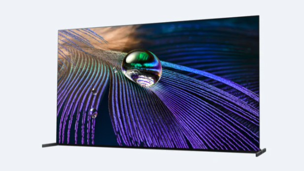 Sony A90J OLED dengan latar belakang putih menampilkan gambar tetesan air di permukaan.