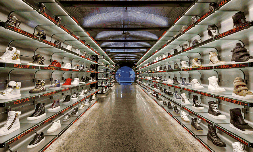 A GIF image that switches between dark and light. The picture is of the aisle with the sneakers on both sides.