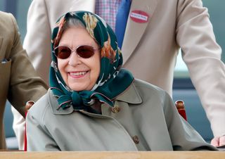 Queen Elizabeth wearing a headscarf