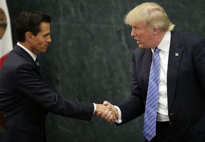 Donald Trump meets Mexican President Enrique Pena Nieto.