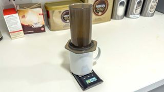 Aeropress coffee maker in use